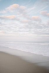 Portrait of blue and pink beach scene in North Carolina