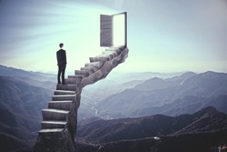 Businessman standing on stairs with abstract open door. Landscape background. Dream, exit and success concept.