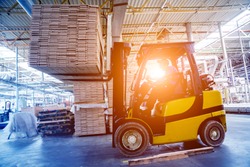 Forklift loader in storage warehouse ship yard. Distribution products. Delivery. Logistics. Transportation. Business background