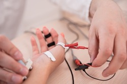 Patient nerves testing using electromyography at medical center