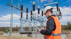 Engineer electrician check the substation construction process