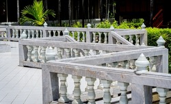 Antique marble pillars hold the railing in the castle