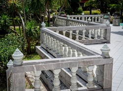 Antique marble pillars hold the railing in the castle