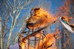 Burning an effigy for Shrovetide. Spring meeting