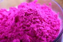 pink color in bowl for holi festival preparation
