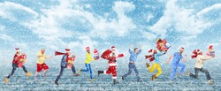 Happy running Christmas people over snowy background