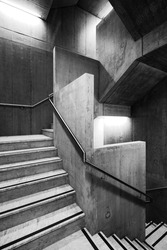 Interior staircase in reinforced concrete, black and white image