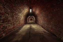 Long underground brick tunnel angle shot