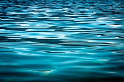 Beautiful blue water surface as a background texture