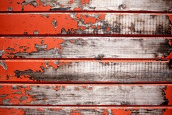 Texture of weathered red wagon on farm.