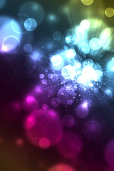 Colorful abstract background of glowing light bubbles like bokeh.