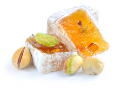 Turkish delight (lokum) with pistachios on a white background, closeup