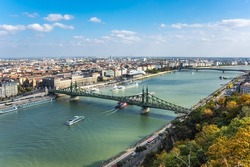 Liberty Bridge or Freedom Bridge in Budapest, Hungary, connects Buda and Pest across the River Danube.The iconic green bridge located in the old town of the Hungarian capital