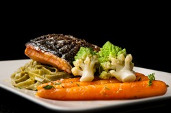 Grilled salmon with pasta, romanesco broccoli and glazed carrots