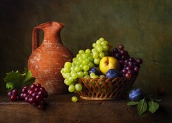 Still life with pears and grapes and plums