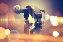 Microphone and headphones.Live music and blurred stage lights. Music background
