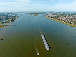 Aerial from a freighter on the river Bovenmerwede near Werkendam in the Netherlands