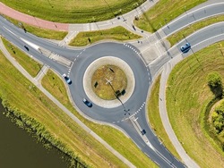 Aerial top down view of roundabout traffic in Amsterdam, Netherlands