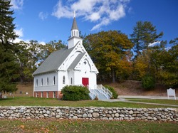 New England white church during the Fall