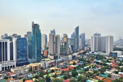 Makati city skyline in Manila, Philippines. Office buildings.