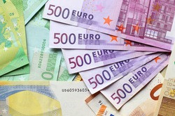 Euro currency banknotes background. European paper money backdrop with 100, 200 and 500 euros bills.