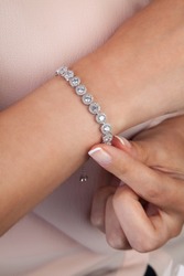 Casual girl with gem bracelet