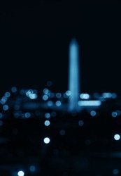 Washington Monument bokeh as the national landmark at night in Washington DC