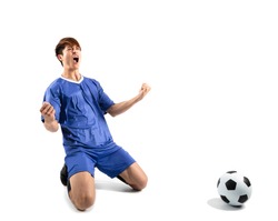 happy asian soccer player celebrating  isolated on white
