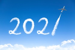 happy New year 2021 concept. cloud drawing by airplane in sky