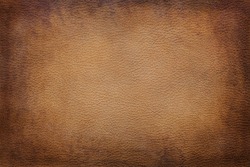 Old vintage brown leather texture closeup can be used as background