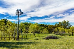 Pretty Texas Hill Country ranch with a windmill.