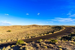 Rural two lane highway in the Arizona desert.