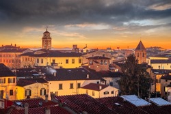 Pisa, Tuscany, Italy town skyline at twilight.