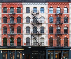 Wall of windows on buildings in Tribeca New York City