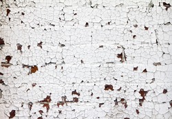 Cracked white paint texture on old grungy brick wall background