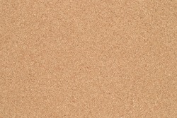 Empty blank cork board or bulletin board. Close up of corkboard texture
