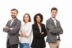 Group of happy multiracial business people standing with arms folded isolated over white background