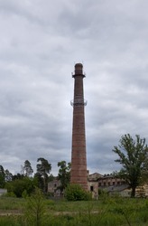 Tall brick chimney, old building heating system
