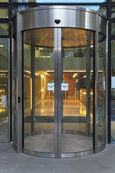 Automatic revolving door at office building