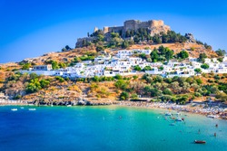 Rhodes, Greece. Lindos small whitewashed village and the Acropolis, scenery of Rhodos Island at Aegean Sea.