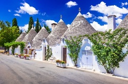 Alberobello, Italy. Trullo conical roof houses, rural Puglia style, italian travel spotlight.