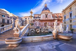 Palermo, Italy. Pretoria Fountain in Piazza Pretoria and Chiesa di Santa Caterina d'Alessandria, Sicily travel spotlight.