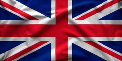 Wide angle banner of the British Union Jack flag or Union Flag in a textured full frame background view