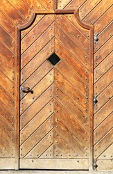 Old wooden door of a house in Prague