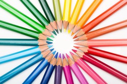 Colourful array of art pencils in creative rainbow spectrum