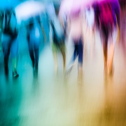big city people walk on road in rainy day, blured motion abstract background.