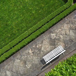 Geometric background with a white bench in a green park. Top view