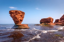View of the iconic and popular Teacup Rock at Thunder Cove Beach, Prince Edward Island, Canada Taken on Sept. 13, 2022.  Just 2 weeks before Hurricane Fiona sadly toppled it over.