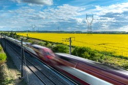 high-speed train crossing a countryside in France