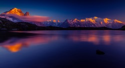 Sunset reflection in a lake in the Mont Blanc Mountains
